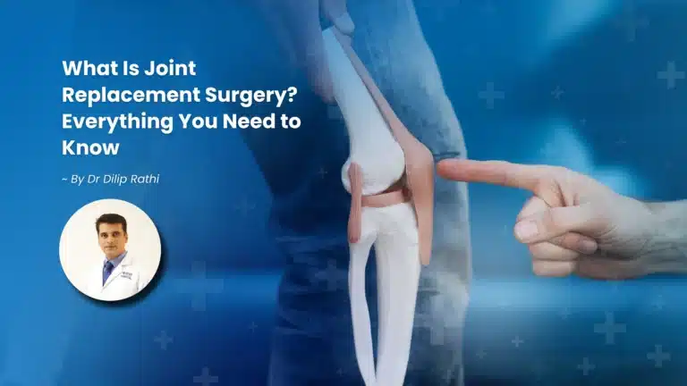 Orthopedic surgeon explaining knee joint replacement surgery using a knee model to a patient at RNH Hospital, Nagpur.